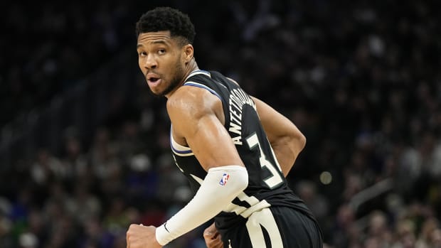 Milwaukee Bucks forward Giannis Antetokounmpo (34) looks over his shoulder 